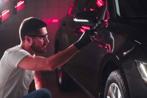 auto body shop inspecting vehicle